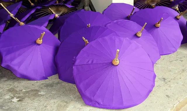 Local artisans crafting traditional handmade souvenirs and umbrella art in Sankhampaeng Chiang Mai